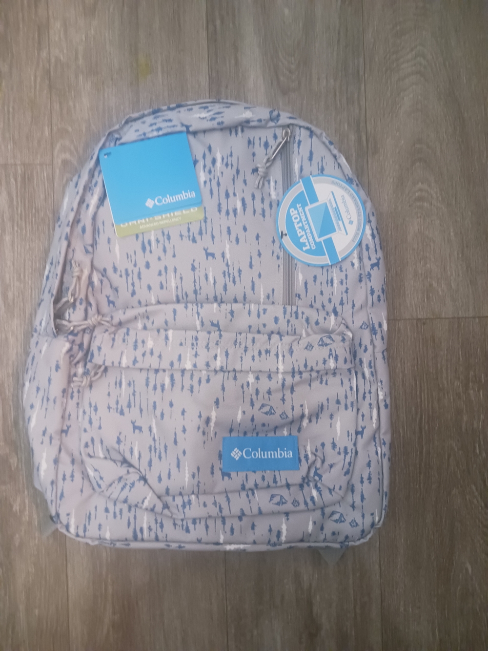 Columbia Beige Backpack with Blue Tree Motif